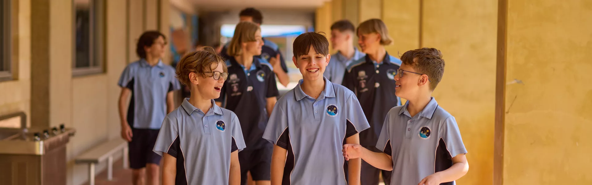 Boy group walking verandah }}