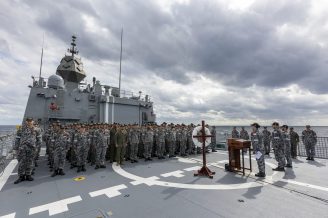A Remembrance Day service is held at sea on board HMAS Warramunga during a Regional Presence Deployment. *** Local Caption *** HMA Ships Brisbane and Warramunga are currently deployed to Southeast and Northeast Asia where they are conducting a number of navy-to-navy engagements with partner nations across the region. 

This deployment continues the Australian Defence Forces robust and long standing program of international engagement in the Indo-Pacific. 

Navy has deployed multiple ships across the region throughout 2021, demonstrating a commitment to working with partners to address shared challenges, including maritime security.